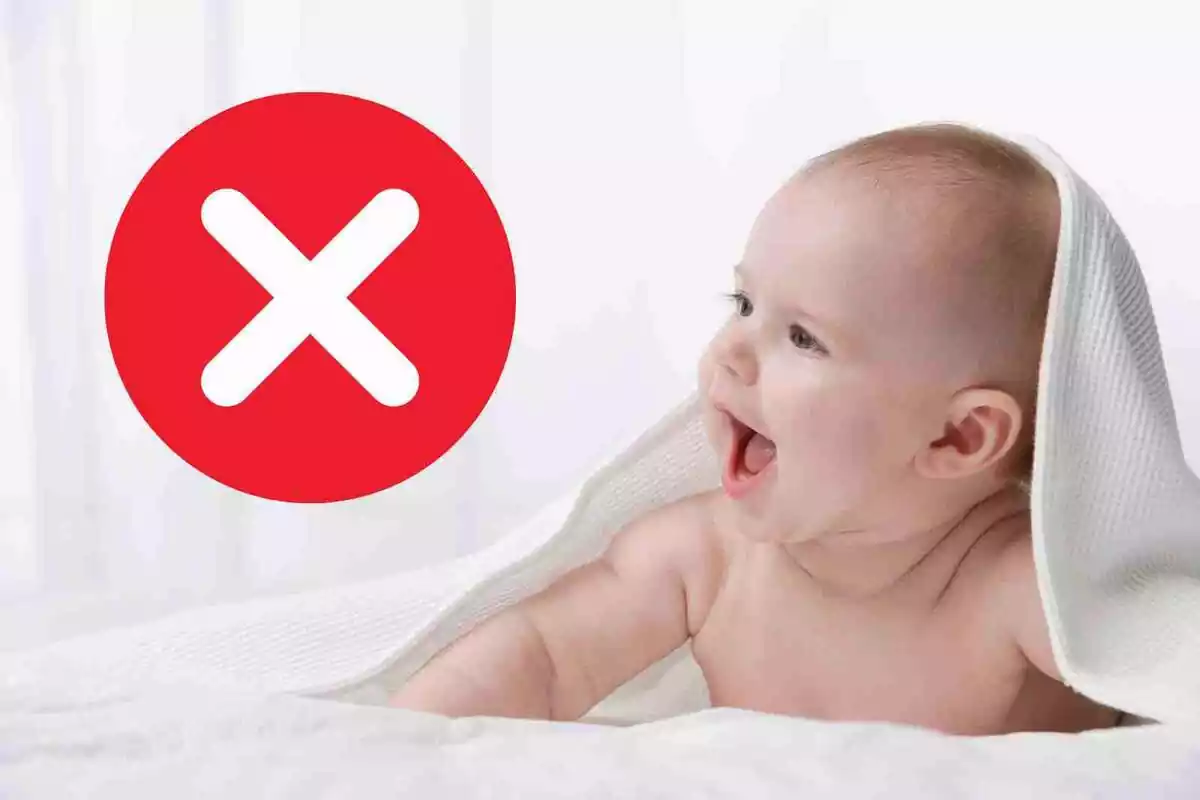 Fotomontaje de un bebé con un símbolo de error