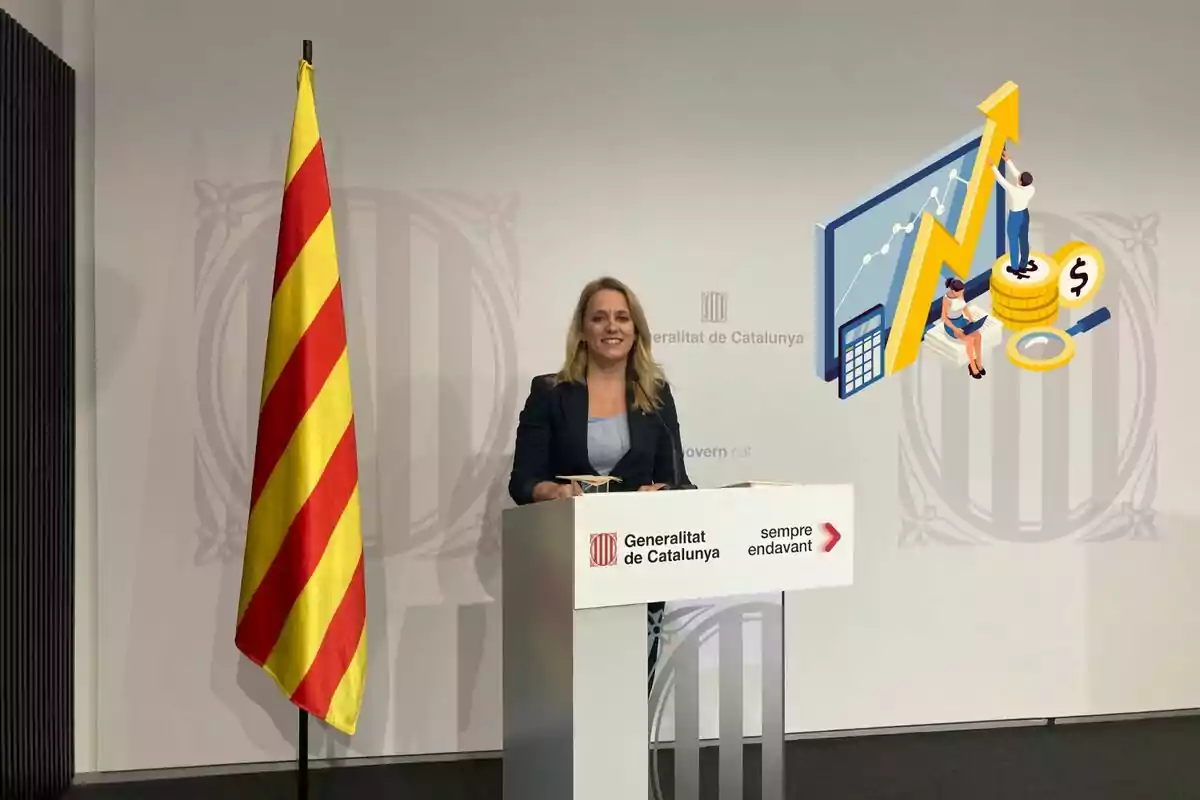 Una mujer rubia está de pie detrás de un podio con el logotipo de la Generalitat de Catalunya y el lema "sempre endavant", junto a una bandera catalana y una ilustración de gráficos financieros en la pared.