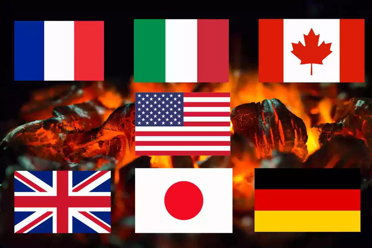Un fotomontaje de carbón quemando con las banderas del G7