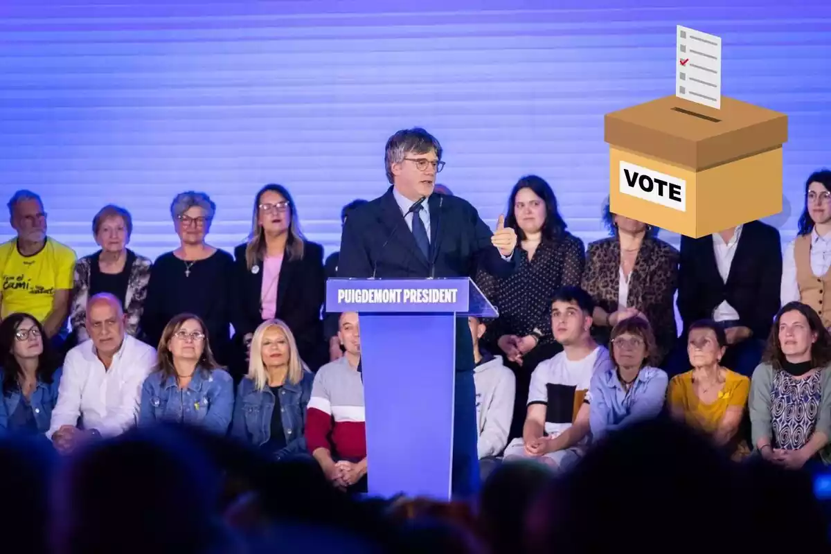 Puigdemont con un símbolo de votar
