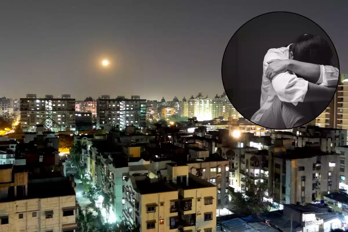 Ciudad de Surat de noche con una mujer lamentándose